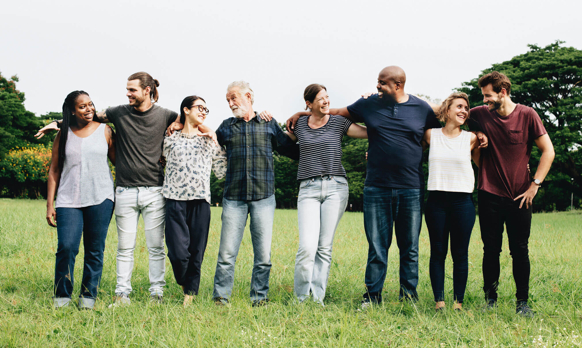 group of people standing in a row